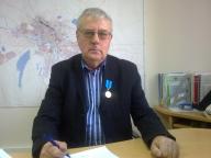 Awarding of a medal «Eren enbegi ushin» to Sokolov А.Е.